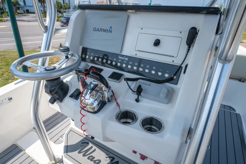 Slide: The Image of Control panel of 2020 Sea Cat 26 Hybrid boat with Garmin navigation system. - 19