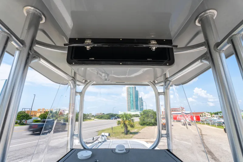 Slide: The Image of 2020 Sea Cat 26 Hybrid boat interior with cityscape view through windshield. - 21