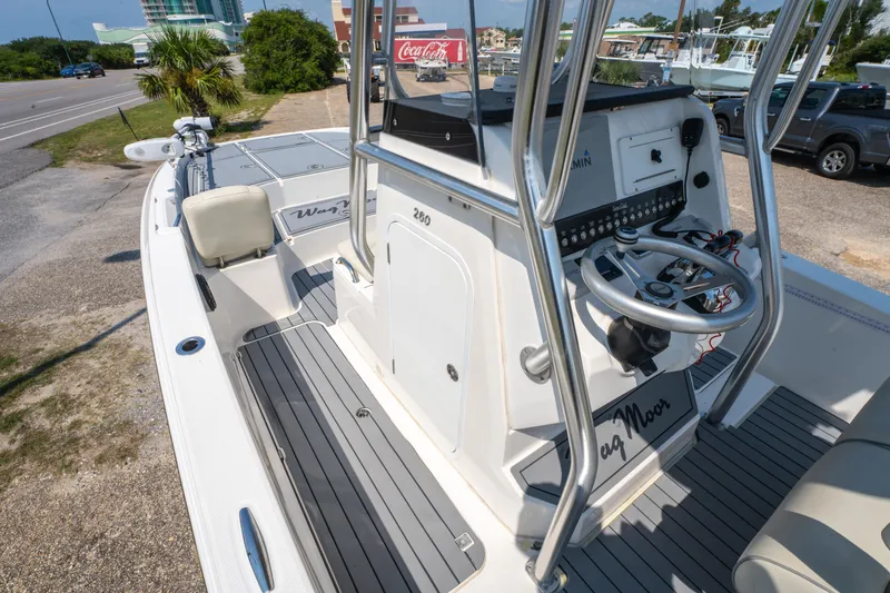 Slide: The Image of 2020 Sea Cat 26 Hybrid boat interior with steering console and seating. - 22