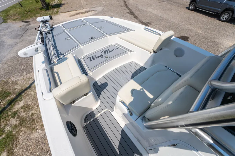 Slide: The Image of 2020 Sea Cat 26 Hybrid boat interior with seating and deck view. - 23