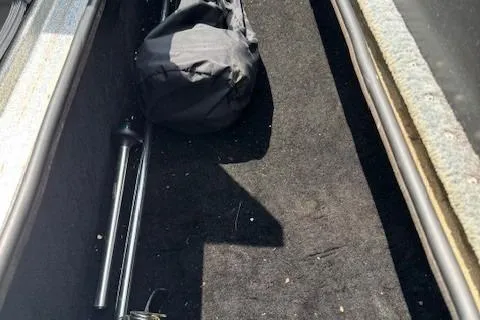 Slide: The Image of Storage compartment of a 2005 Triton Tr-186 DC boat with equipment. - 20