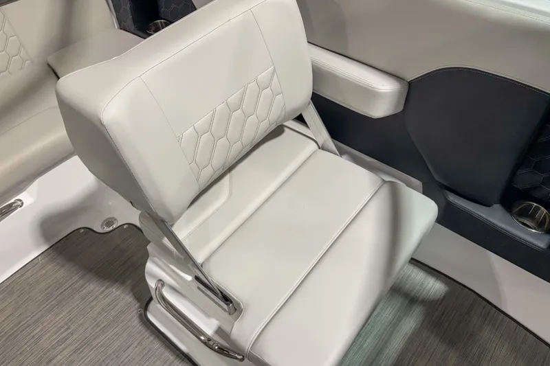 Slide: The Image of 2026 Four Winns H2 boat seat with modern design and hexagonal stitching. - 13
