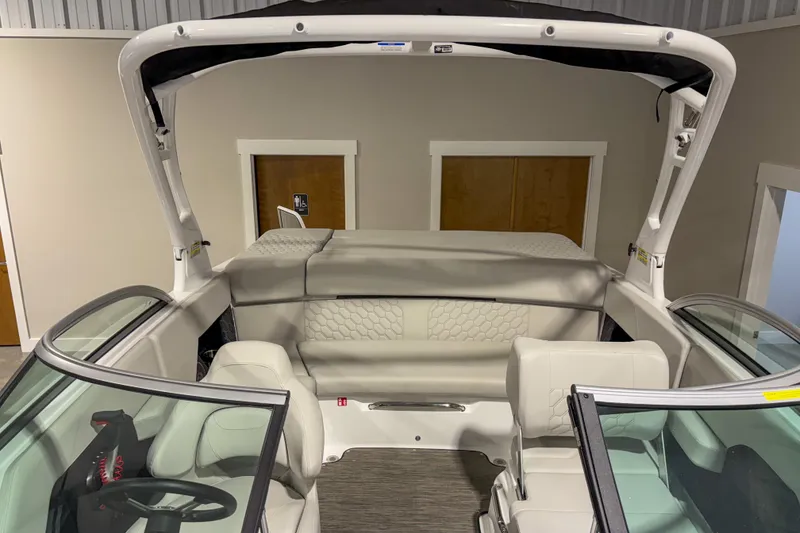 Slide: The Image of 2026 Four Winns H2 boat interior with modern seating and sleek design. - 3