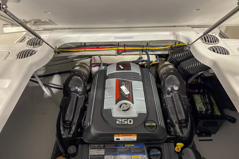 Slide: The Image of Engine compartment of 2026 Four Winns H2 boat, featuring a Mercury 250 engine. - 6