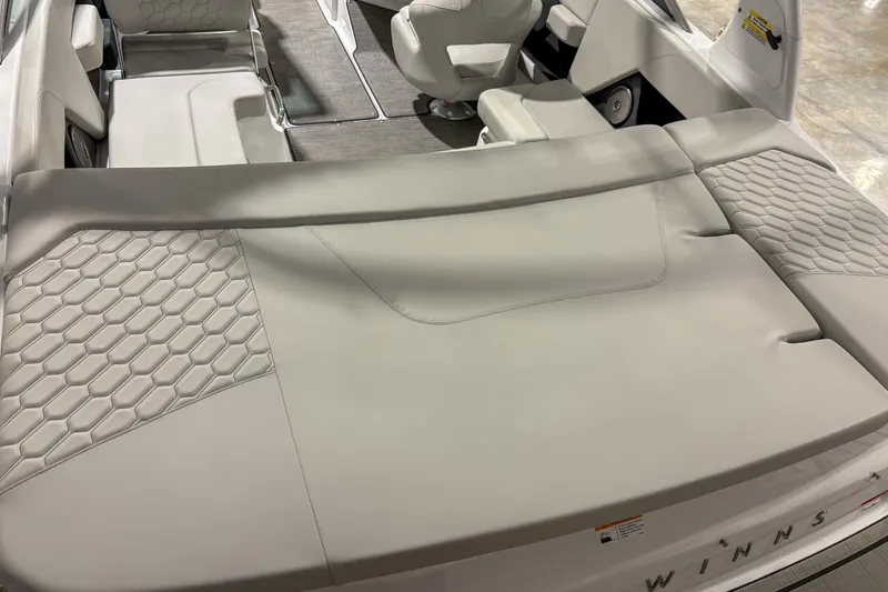 Slide: The Image of 2026 Four Winns H2 boat interior with stylish seating and modern design. - 9