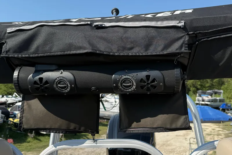 Slide: The Image of 2021 Sun Tracker Party Barge 22 DLX with mounted speakers and canopy. - 11