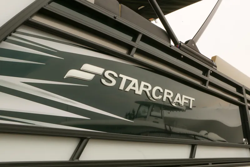 Slide: The Image of 2026 Starcraft SLS 3 boat with sleek design and logo detail. - 30