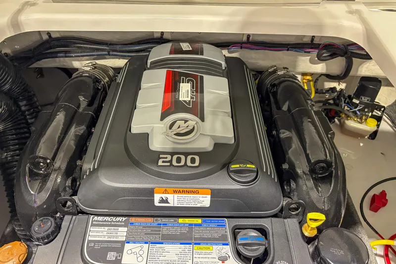 Slide: The Image of 2026 Four Winns H1 boat engine, featuring a Mercury 200 horsepower motor. - 5