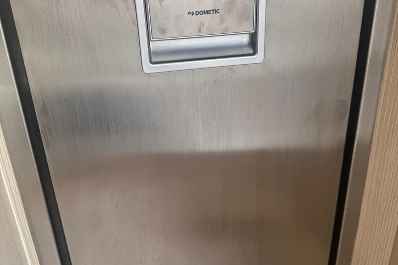 Slide: The Image of Stainless steel Dometic appliance on 2023 Scout 400 LXF boat. - 29