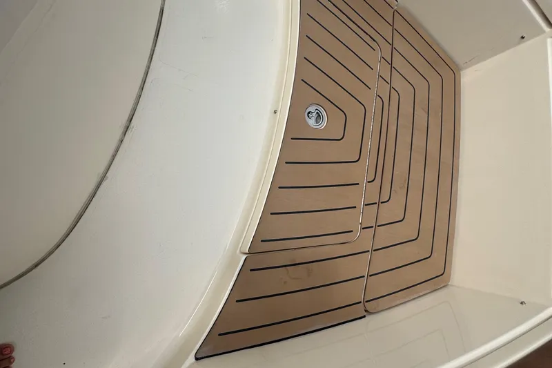 Slide: The Image of 2023 Scout 400 LXF boat deck with sleek, modern design and non-slip surface. - 47