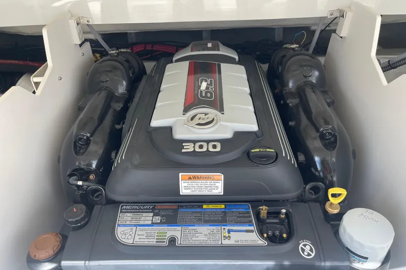 Slide: The Image of 2024 Crownline 240 SS engine compartment with Mercury 300 HP motor. - 8