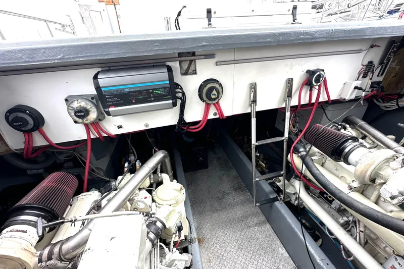 Slide: The Image of Engine room of 1990 Custom NUWAVE 36 boat with visible machinery and control panel. - 30