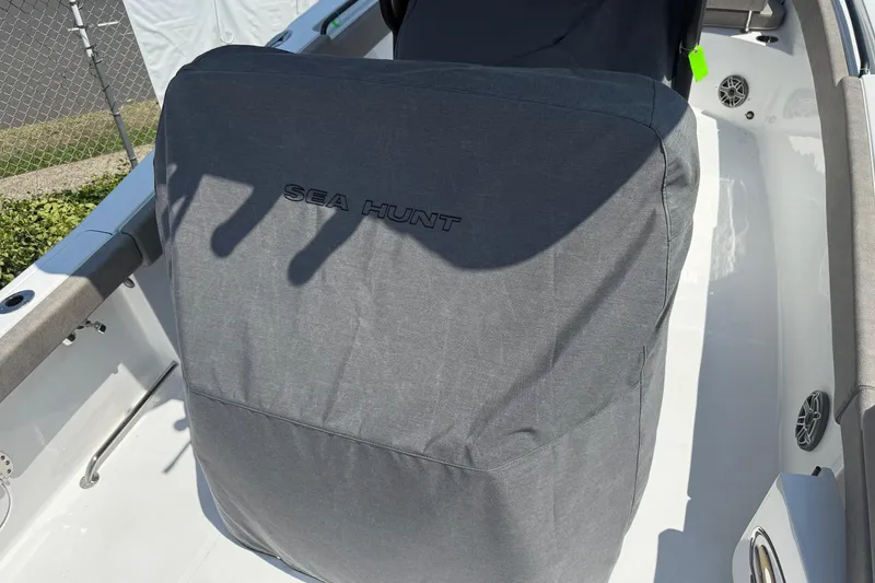 Slide: The Image of 2026 Sea Hunt Ultra 265 SE boat seat with protective cover. - 7