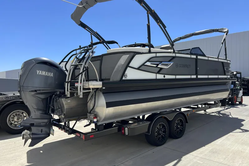 Slide: The Image of 2022 Godfrey AquaPatio 255 SBW pontoon boat with Yamaha engine on trailer. - 11