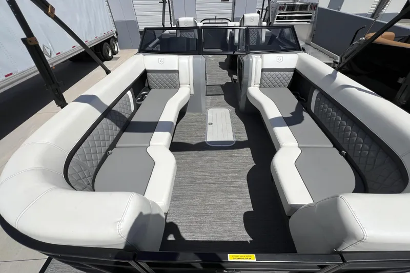 Slide: The Image of 2022 Godfrey AquaPatio 255 SBW pontoon boat with spacious seating and modern design. - 5