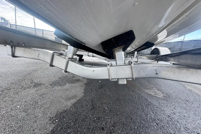 Slide: The Image of Underneath view of a 2018 Scarab 195 G boat on a trailer. - 21