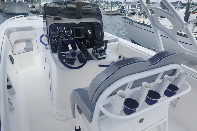 Slide: The Image of 2014 Concept 30 Cuddy boat interior with modern dashboard and seating. - 10