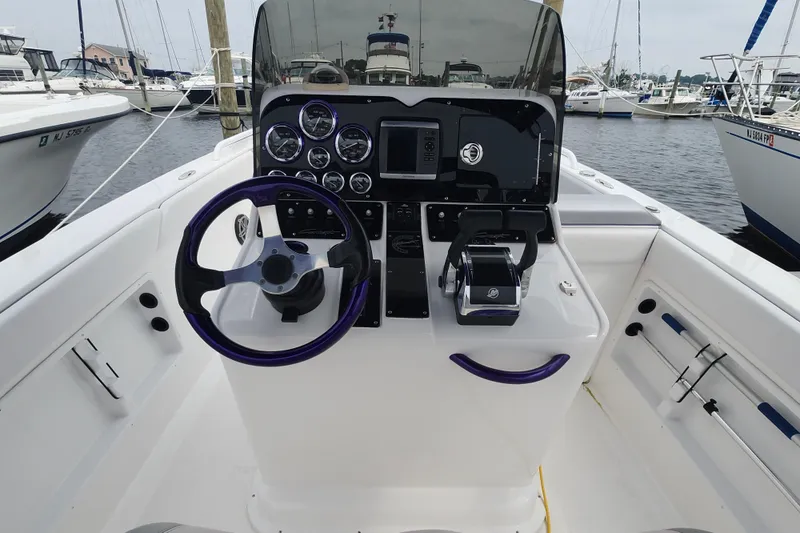 Slide: The Image of Cockpit of 2014 Concept 30 Cuddy boat with steering wheel and control panel. - 15