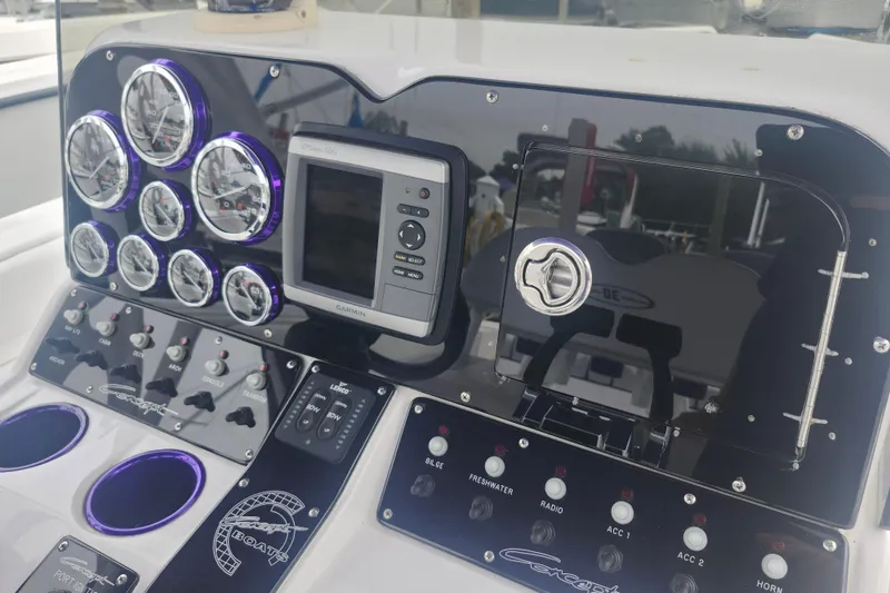 Slide: The Image of Control panel of 2014 Concept 30 Cuddy boat with gauges and Garmin device. - 16