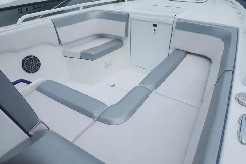 Slide: The Image of 2014 Concept 30 Cuddy boat interior with gray and white seating. - 21