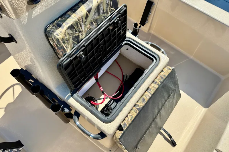 Slide: The Image of Open storage compartment in 2026 Carolina Skiff E18 JVX CC boat. - 16
