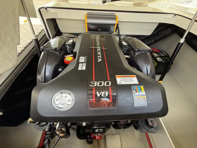 Slide: The Image of Volvo Penta 300 V8 engine in a 2014 Cobalt 24SD boat. - 38