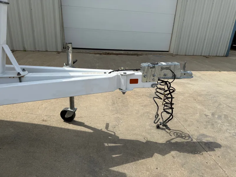 Slide: The Image of Trailer hitch of a 2014 Cobalt 24SD on concrete surface. - 45