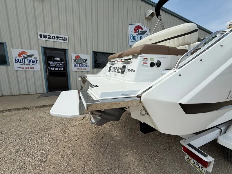 Slide: The Image of 2014 Cobalt 24SD boat at Boji Boat Brokers, exterior view with swim platform. - 9
