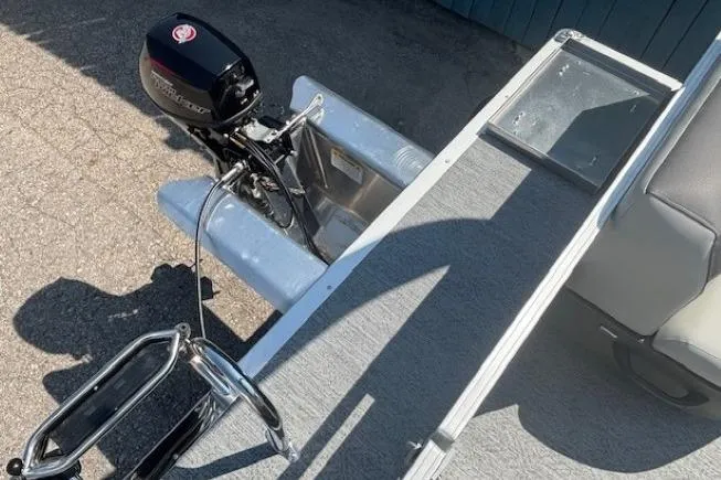 Slide: The Image of 2026 Sun Tracker Bass Buggy 16 XL Select pontoon boat with motor, viewed from above. - 20