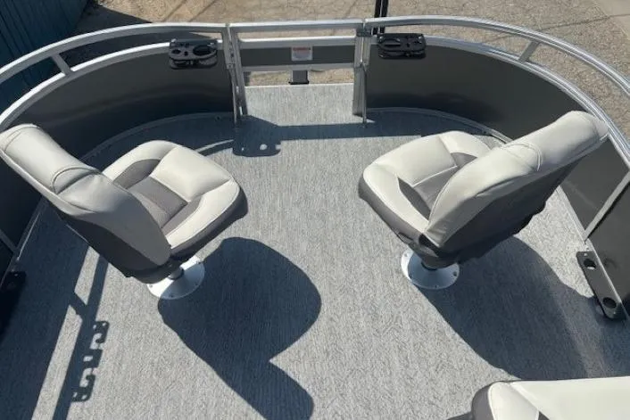 Slide: The Image of 2026 Sun Tracker Bass Buggy 16 XL Select pontoon boat with two swivel seats. - 8