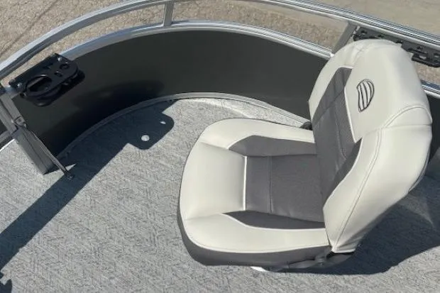 Slide: The Image of 2026 Sun Tracker Bass Buggy 16 XL Select boat seat with cup holder, gray carpet. - 9