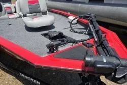 Slide: The Image of 2017 Bass Tracker Pro Team 175 boat with red trim and fishing seat. - 3