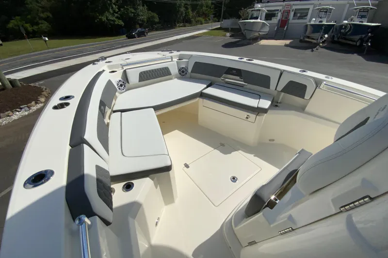 Slide: The Image of 2026 Cobia 265 Open Center Console boat with spacious seating and modern design. - 28