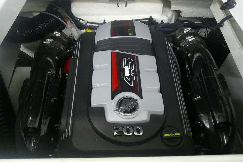 Slide: The Image of 2018 Sea Ray SPX 190 engine compartment with 4.5L 200 HP engine. - 9