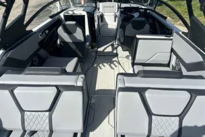 Slide: The Image of 2025 Yamaha Boats 255XD interior with modern seating and sleek design. - 4