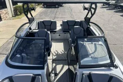 Slide: The Image of 2025 Yamaha Boats 255XD interior with sleek seating and modern design. - 6