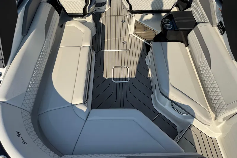 Slide: The Image of 2024 Sea Ray SLX 280 boat interior with luxurious seating and modern design. - 19
