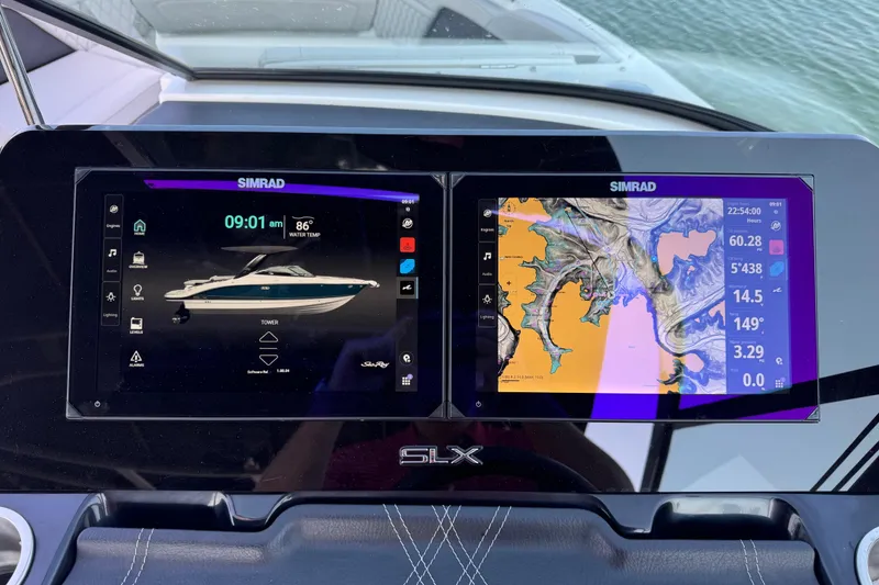 Slide: The Image of 2024 Sea Ray SLX 280 dashboard with dual Simrad displays showing navigation and boat controls. - 8