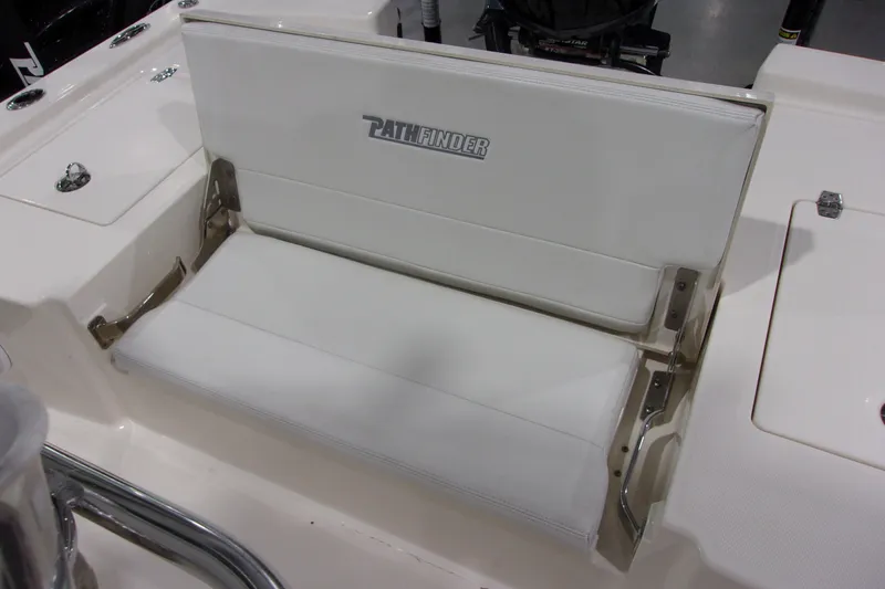 Slide: The Image of 2024 Pathfinder 2200 boat seat with white upholstery and stainless steel hardware. - 13