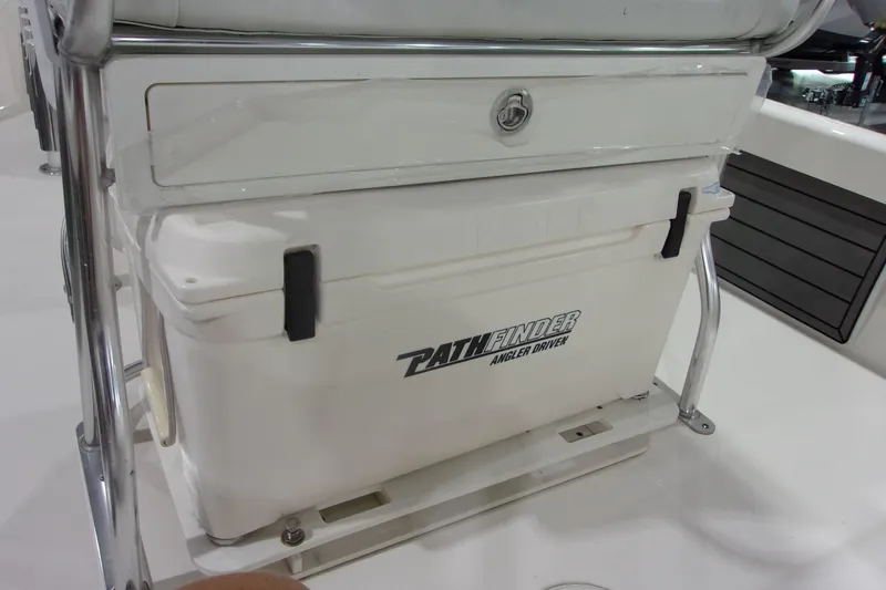 Slide: The Image of 2024 Pathfinder 2200 boat cooler with secure latch and angler driver branding. - 14