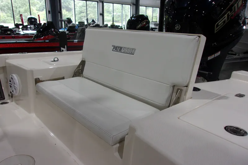 Slide: The Image of 2024 Pathfinder 2200 boat interior with white seating and modern design. - 6
