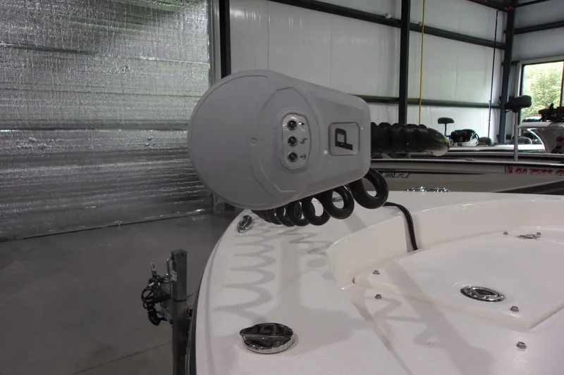 Slide: The Image of 2024 Pathfinder 2200 boat detail in a showroom, featuring advanced equipment. - 9