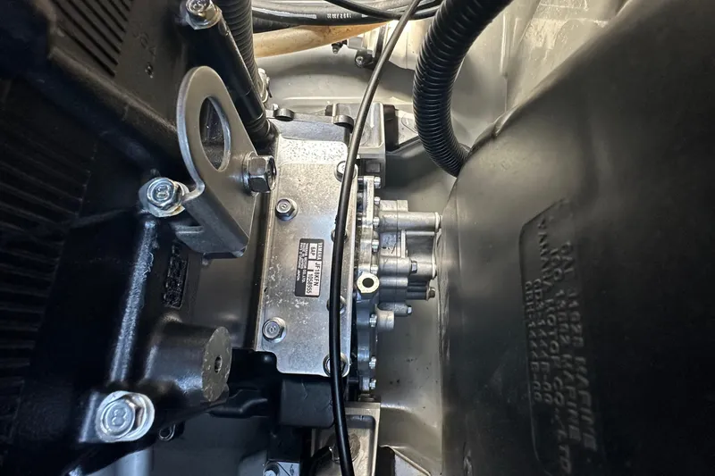 Slide: The Image of Engine components of 2023 Yamaha Boats 252 FSH Sport, showcasing intricate mechanical details. - 18