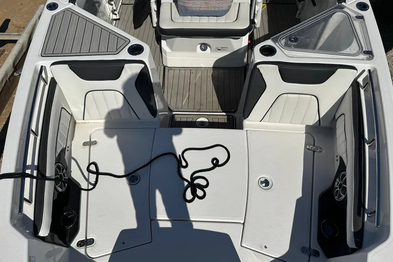 Slide: The Image of 2023 Yamaha Boats 252 FSH Sport interior with seating and deck details. - 38