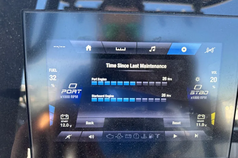 Slide: The Image of Dashboard of 2023 Yamaha Boats 252 FSH Sport showing maintenance hours and fuel level. - 45