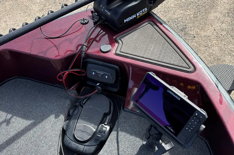 Slide: The Image of 2021 Tracker Nitro ZV21 boat dashboard with Minn Kota and Lowrance electronics. - 12