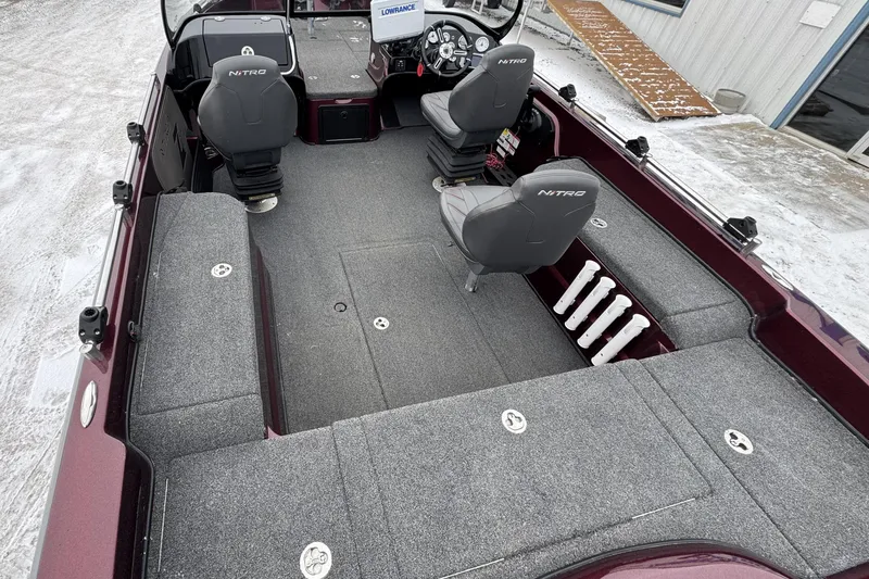 Slide: The Image of Interior of 2021 Nitro ZV21 fishing boat with seating and storage compartments. - 28