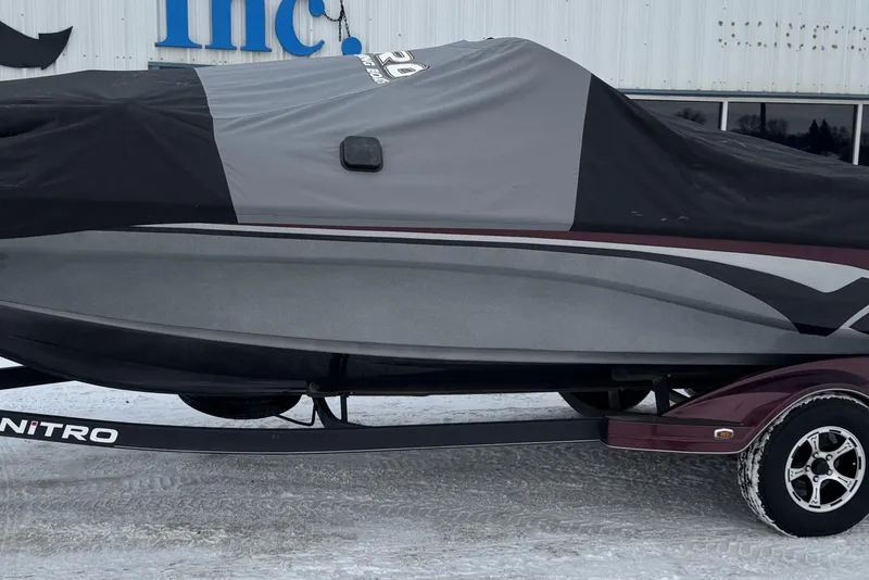 Slide: The Image of Covered 2021 Nitro ZV21 boat on trailer in snowy setting. - 33
