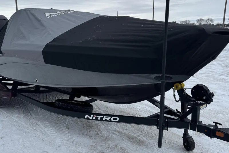 Slide: The Image of Covered 2021 Nitro ZV21 boat on trailer in snowy setting. - 35
