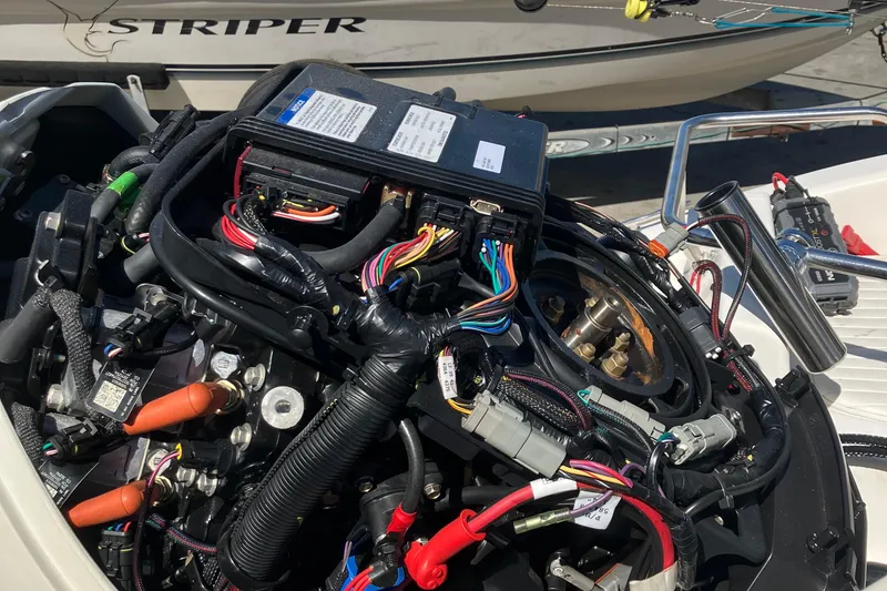 Slide: The Image of Close-up of a 2002 Boston Whaler 160 Dauntless boat engine wiring. - 5